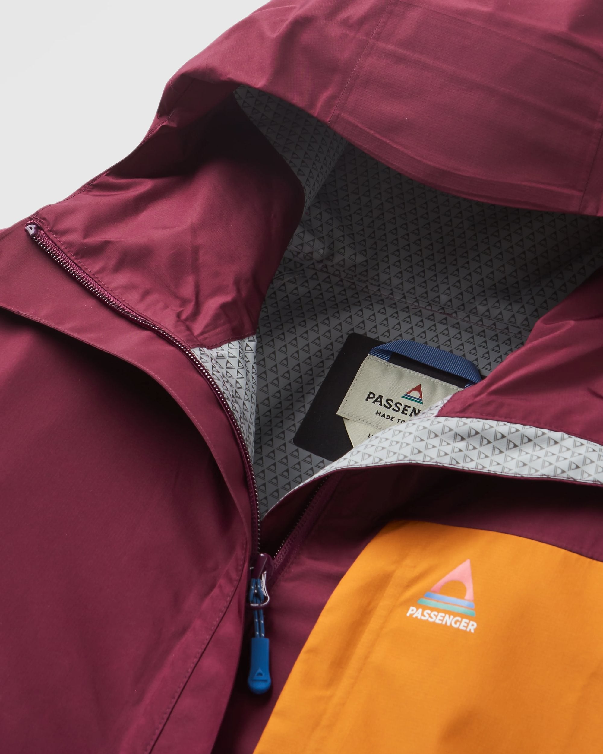 Trailscape Women's Recycled Waterproof Jacket - Fig/Wild Berry - Flatlay