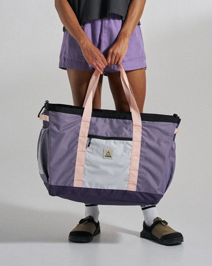 Boondocker Gear Tote 60L - Heather/ Deep Purple - Studio Model - Female
